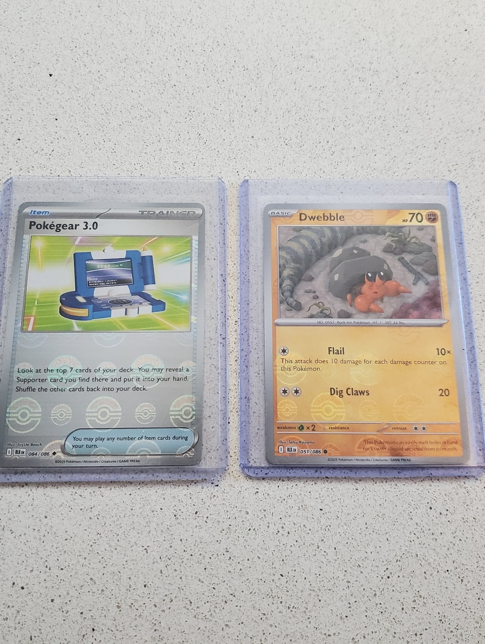 Pokémon Dwebble and Pokegear 3.0 Pokeball Cards.